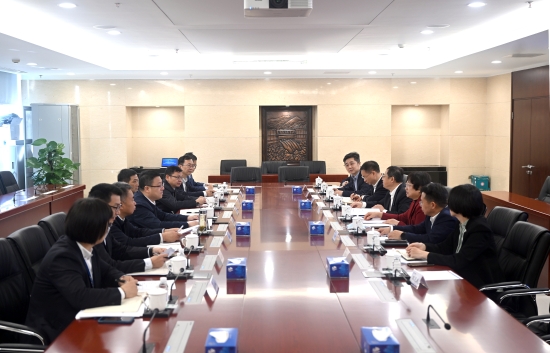 中國電建黨委常委、副總經理王小軍與中國華電集團黨組成員、副總經理李旭紅會談
