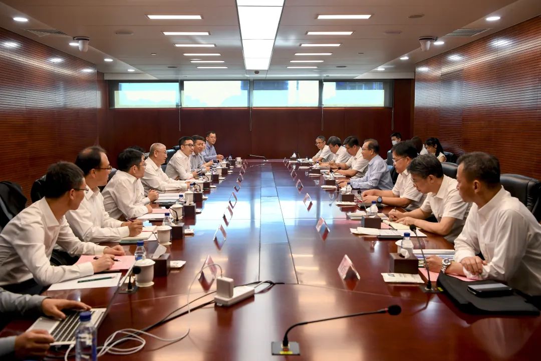 華電集團黨組書記、董事長江毅會見隆基綠能總裁李振國