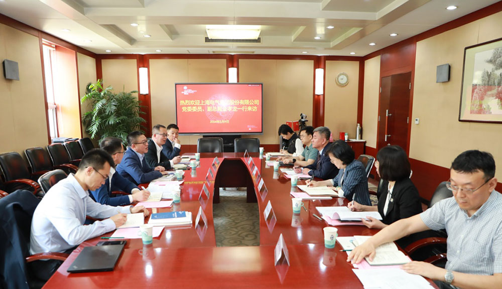 中電聯黨委委員、秘書長郝英杰會見上海電氣集團黨委委員、副總裁金孝龍一行